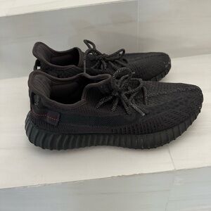 Black Yeezy sneaker size 8.5 or 42 European size.